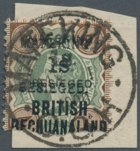 Mafeking 1s on 4d Green and Brown double overprint (serif and sans serif)